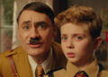 Hitler (Taika Waititi) e  Jojo (Roman Griffith Davis): inconsciente. Imagem: Divulgação.