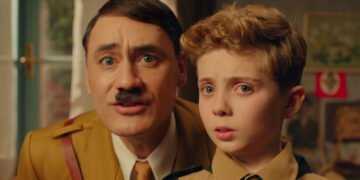 Hitler (Taika Waititi) e  Jojo (Roman Griffith Davis): inconsciente. Imagem: Divulgação.