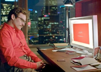Theodore (Joaquin Phoenix), o protagonista, apaixona-se pela voz vinda de um sistema operacional. Imagem: Divulgação.
